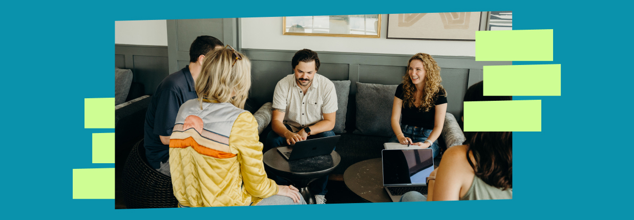 Professionals engaged in strategy session with digital tools for inbound content marketing