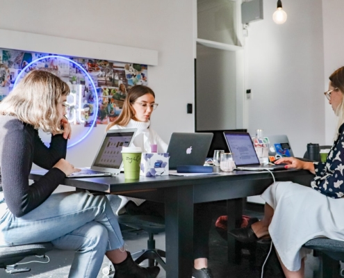 women working on a computer