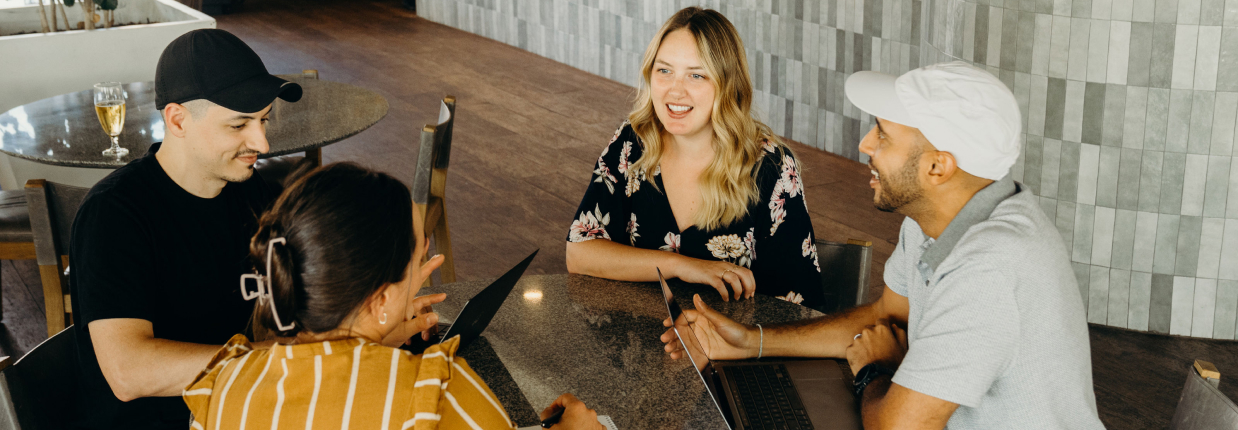 Team meeting in progress with members discussing content marketing strategies