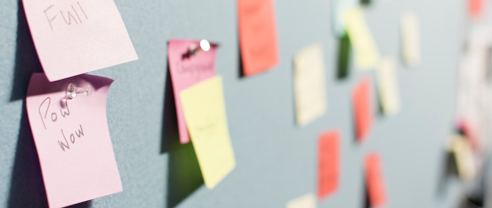 Sticky notes on the wall.