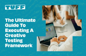 Professionals analyzing data on computer screens with 'The Ultimate Guide To Executing A Creative Testing Framework' title overlay